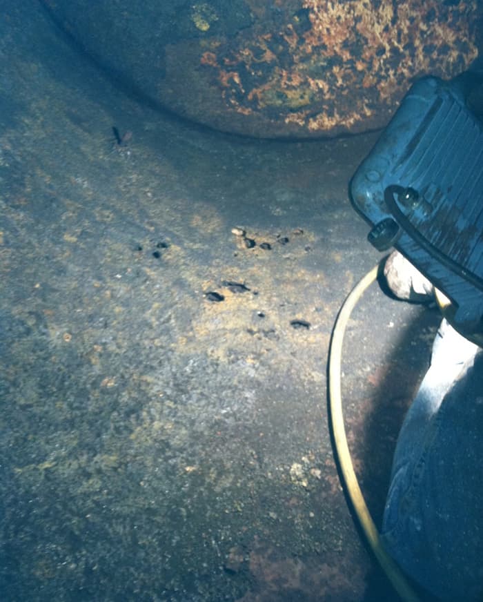 Leaking hot water purge tank
