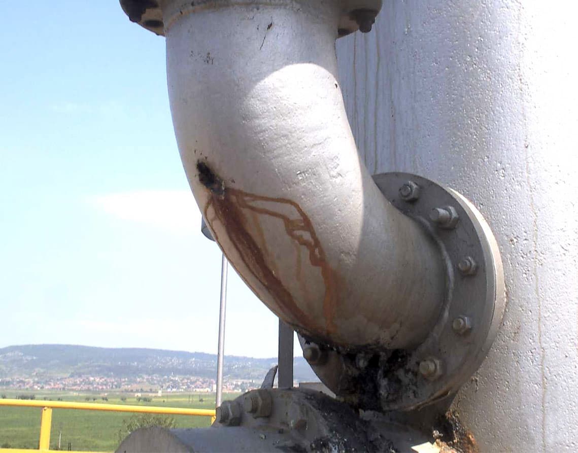 Corroded area and leaking hole on the Methane pipework
