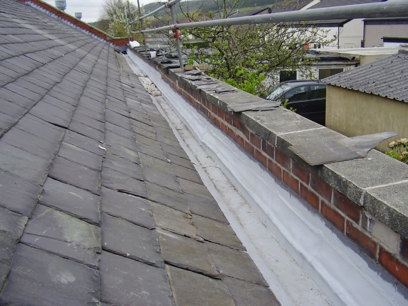Gutter, flashing, and roof detail areas sealed