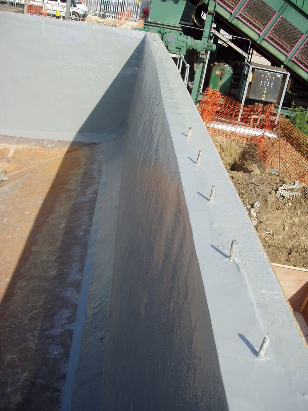 Potable water tank interior blasted, rebuilt, and lined for drinking-water contact
