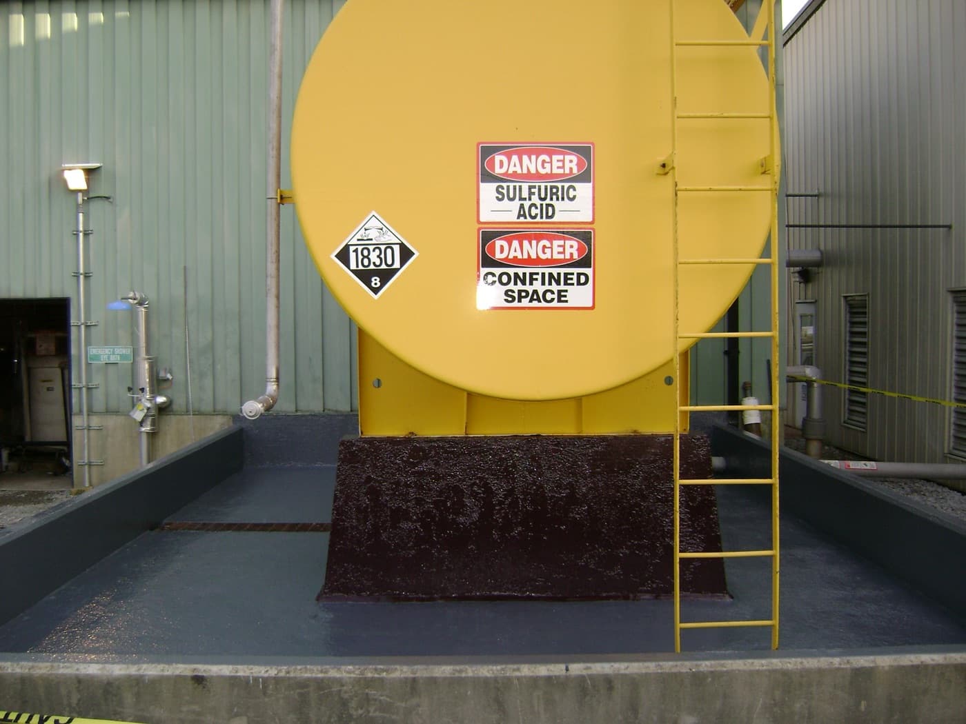 Watertight immersion lining carried across a rebuilt containment surface